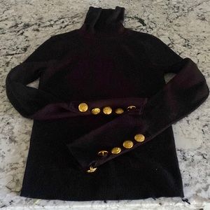 A.L.C. Black turtleneck sweater with gold button detailing on sleeves